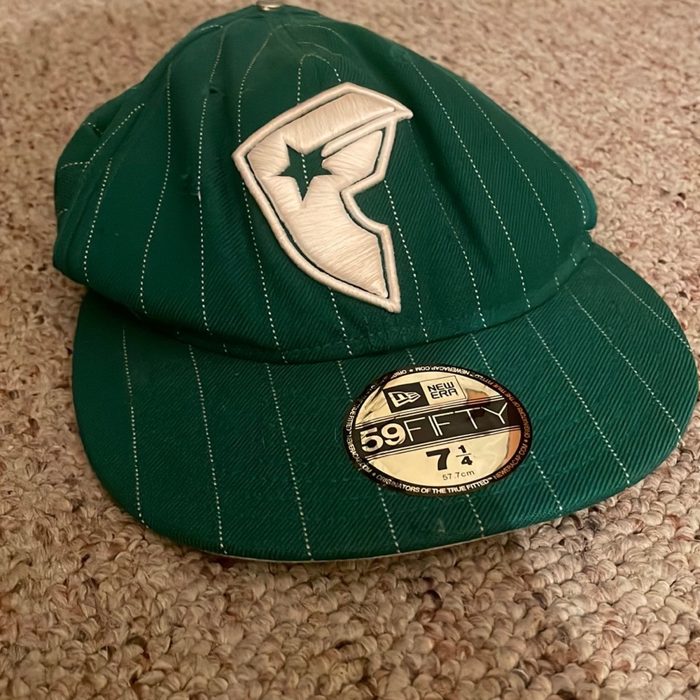Famous stars and straps 7 1/4 hat previously worn not in perfect condition